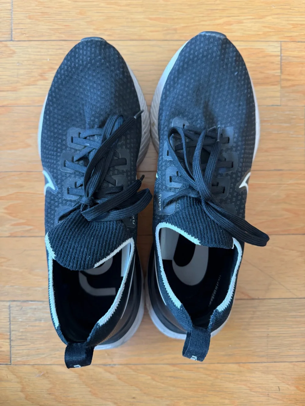 Nike Men's React Flyknit Black and White Running Shoes